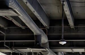 Duct work in a modern commercial HVAC system, AC Services.