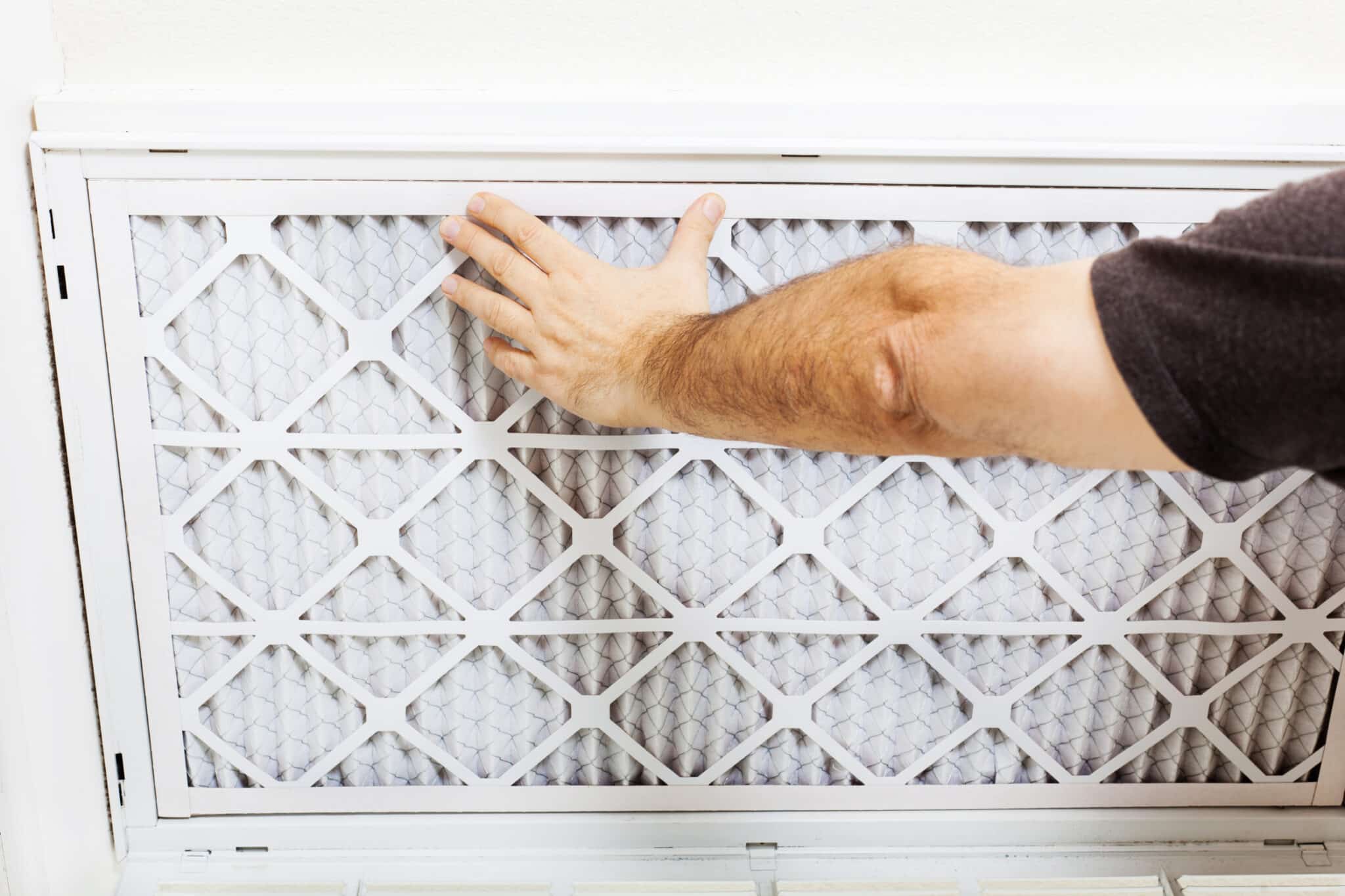 Replacing AC filter for a home air conditioning system, HVAC.